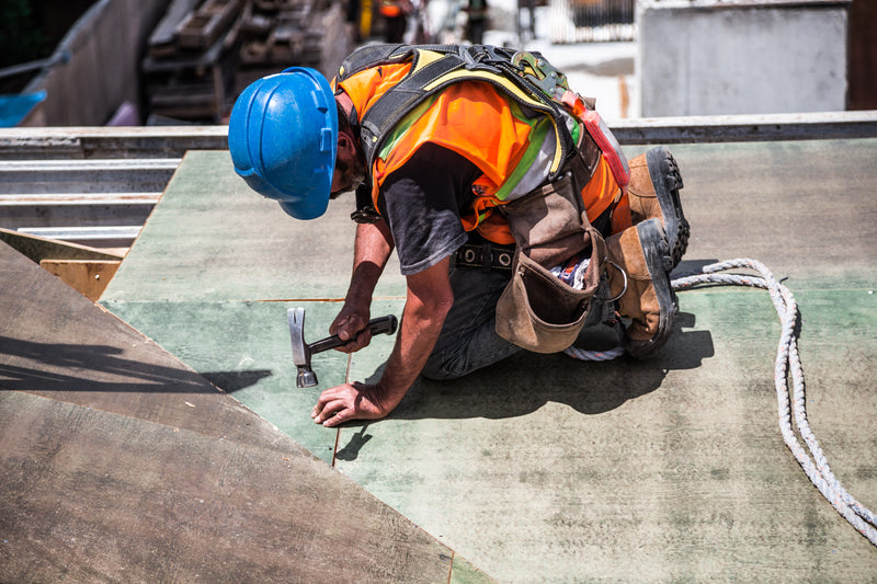 Construction homme marteau chantier